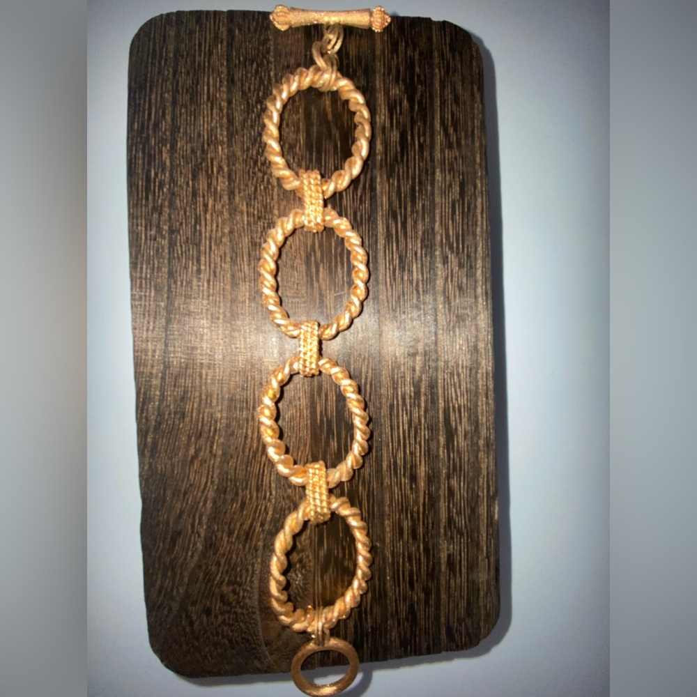 Rose Gold twisted oval link bracelet.